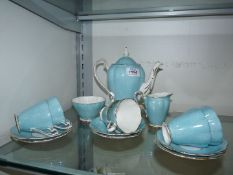 A Royal Standard coffee set in mottle light blue comprising of; coffee pot, sugar bowl,