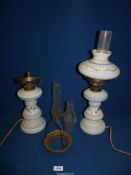 A Pair of Milk Glass oil lamps converted to electric, one with shade, three chimneys a/f.