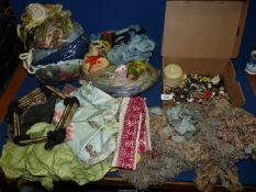 A large quantity of wool for tapestry, box of buttons and braiding.