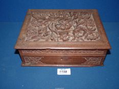 A carved Box, with floral detail, 10" x 8" x 3 1/2".