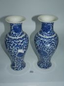 A pair of blue and white oriental baluster Vases, 12 1/4'' tall, six character mark to base.