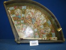 A polychrome painted and gilded detailed Fan depcting elaborately dressed ladies and mounted in a