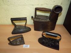 A group of four Irons including a Tailors charcoal Iron with chimney (Fred Jepson), G. Salter & Co.