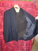 A Lillico Hacker navy blue double breasted jacket and waistcoat along with navy pinstripe trousers,