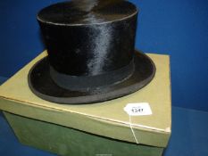 A Tress & Co. London black Top hat, size 7 approx. in green box.