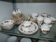 A Colclough 'Stratford' part teaset, orange rose pattern including; teapot, eight cups, ten saucers,