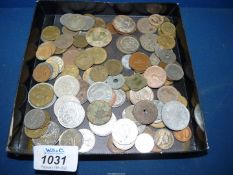 A quantity of miscellaneous foreign coins, found by a metal detector.