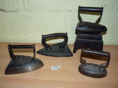 A group of four Irons including No. 12 Flat Iron mark indistinct R. K.., Salter No.