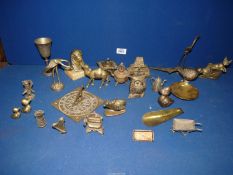 A box of mixed brass ornaments etc. including a brass inkwell, sundial plaque, camel etc.