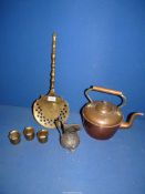 A small quantity of metals including; a copper kettle, pewter jug, brass numbered cups,