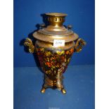 A brass effect Samovar with floral pattern to the outside and tap, 15" tall.
