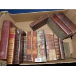 A quantity of leather bound books, a/f, including Cornelli Lansenii, Shakespeare volume 2 and 3,