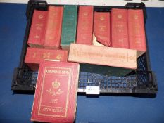 Seven volumes of Almanach De Gotha dating from 1896 to 1918 and a Whitaker's Almanack, dated 1946.