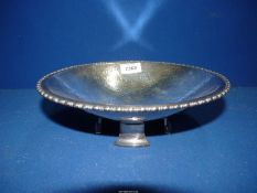 A silver plated Arts & Crafts hammered footed Bowl, 10 1/4" diameter.