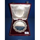 A Silver presentation Plate in a burgundy case inscribed 'Presented To Mr P Rees and Mrs Rees On