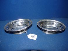 A pair of Silver bon-bon Dishes having pierced decoration, London 1925, maker Walker & Hall, 148g.