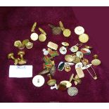 A quantity of cufflinks including a pair of 9ct gold studs, a pair of German Silver cufflinks,