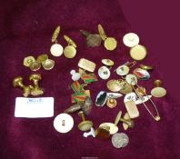 A quantity of cufflinks including a pair of 9ct gold studs, a pair of German Silver cufflinks,