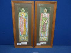 A pair of framed and mounted Watercolours depicting stained glass pictures of 'St John The Baptist'