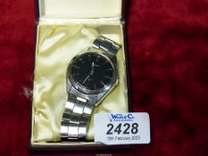 A boxed Seiko stainless steel cased 17 jewel gentleman's Wristwatch having a stainless steel strap,