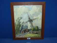 A wooden framed Print label of a Windmill,