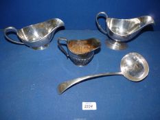 A small quantity of silver plated tableware to include; two sauce boats, a soup ladle, cream jug,