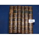 Six leather bound volumes of "Plutarch's Lives, translated from The Greek with Notes,
