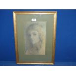 A framed and mounted Charcoal Portrait of a young Lady, signed lower right 'Evilyn Darling',