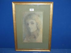 A framed and mounted Charcoal Portrait of a young Lady, signed lower right 'Evilyn Darling',