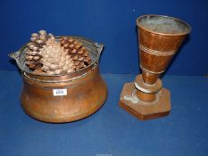 A copper coal Bucket, containing large pine cones, plus a copper vase, 13" tall.