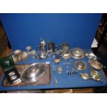 A quantity of plated ware to include toast racks, tankards, sauce boats, teapot, candle snuffer,