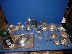A quantity of plated ware to include toast racks, tankards, sauce boats, teapot, candle snuffer,