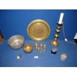 A small quantity of brass including candlestick, weights, charger, copper bowl etc.