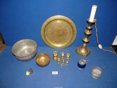 A small quantity of brass including candlestick, weights, charger, copper bowl etc.
