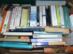 A box of books including The Scramble from Africa, Embers by Sandor Marai,