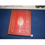 A red cloth and gilt bound copy of History of The Delhi Coronation Durbar,