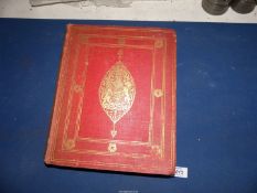 A red cloth and gilt bound copy of History of The Delhi Coronation Durbar,