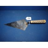 A Sterling silver presentation Trowel with Bakelite handle with the inscription 'Used By His