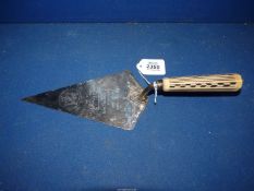 A Sterling silver presentation Trowel with Bakelite handle with the inscription 'Used By His