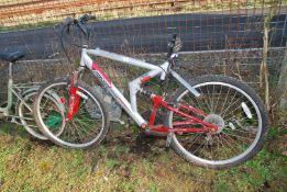 A 12 speed Apollo Gents mountain Bicycle, red and silver.