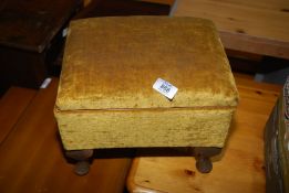 A small sewing box with mustard cover.