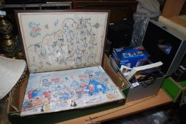 A box of miscellanea including embroidery map 1939, prints, CCTV camera system etc.