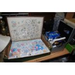 A box of miscellanea including embroidery map 1939, prints, CCTV camera system etc.