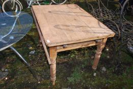 A Pine Kitchen Table with end drawer, 42'' x 30'' plus 10'' drop leaf.