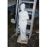 A garden figure of a lady, 34'' high.