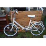 A Wayfarer folding Bicycle, white.