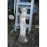 A concrete figure of a girl, 30'' high.