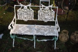 A two seater aluminium Garden Bench, painted white, 37'' wide x 34'' high, a/f.