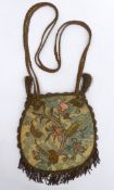 A very fine early 19th century reticule handbag worked with silk appliques and wire threads over a