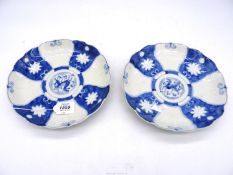 A pair of 19th century Japanese porcelain "Kylin" plates.